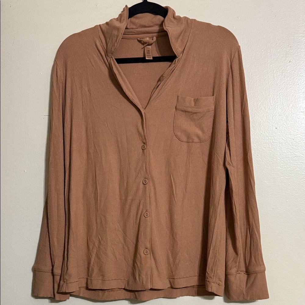 Skims button down top